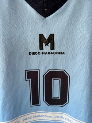 Maradona Homenaje Chica Amplia